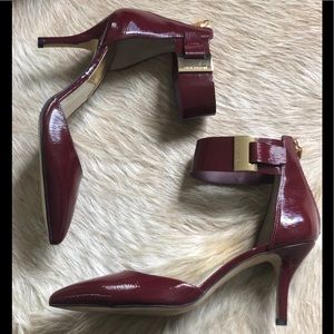 Michael Kors claret shoes.